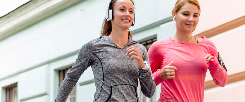 Mulheres a correrem | Fitness | Treinos | Holmes Place