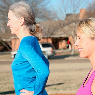 Holmes Place | Women Exercising Outdoors