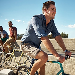 Holmes Place | Man riding bike