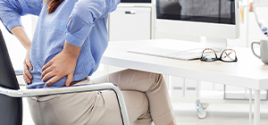 dor nas costas aos 40 anos | prevenção | holmes place