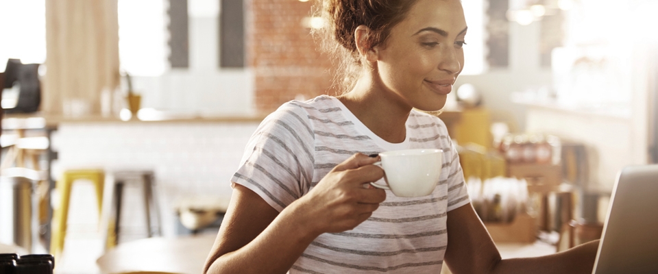 Holmes Place | woman coffee lounging sunny