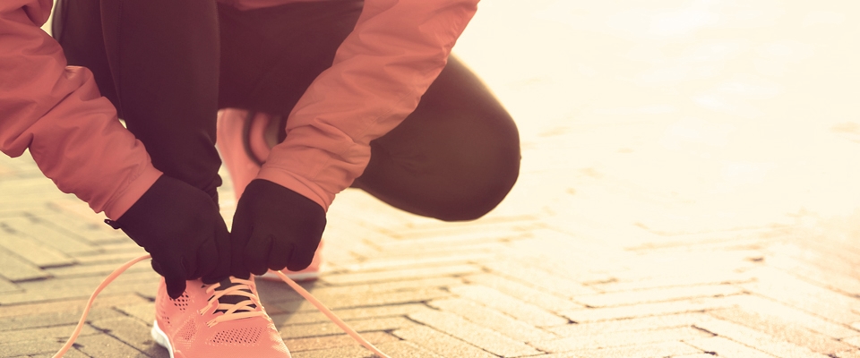 Holmes Place | Person Tying Shoes