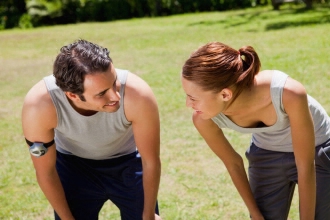 running couple resting