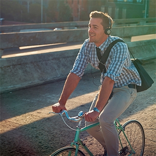 Holmes Place | Man Riding Bike Listening Music